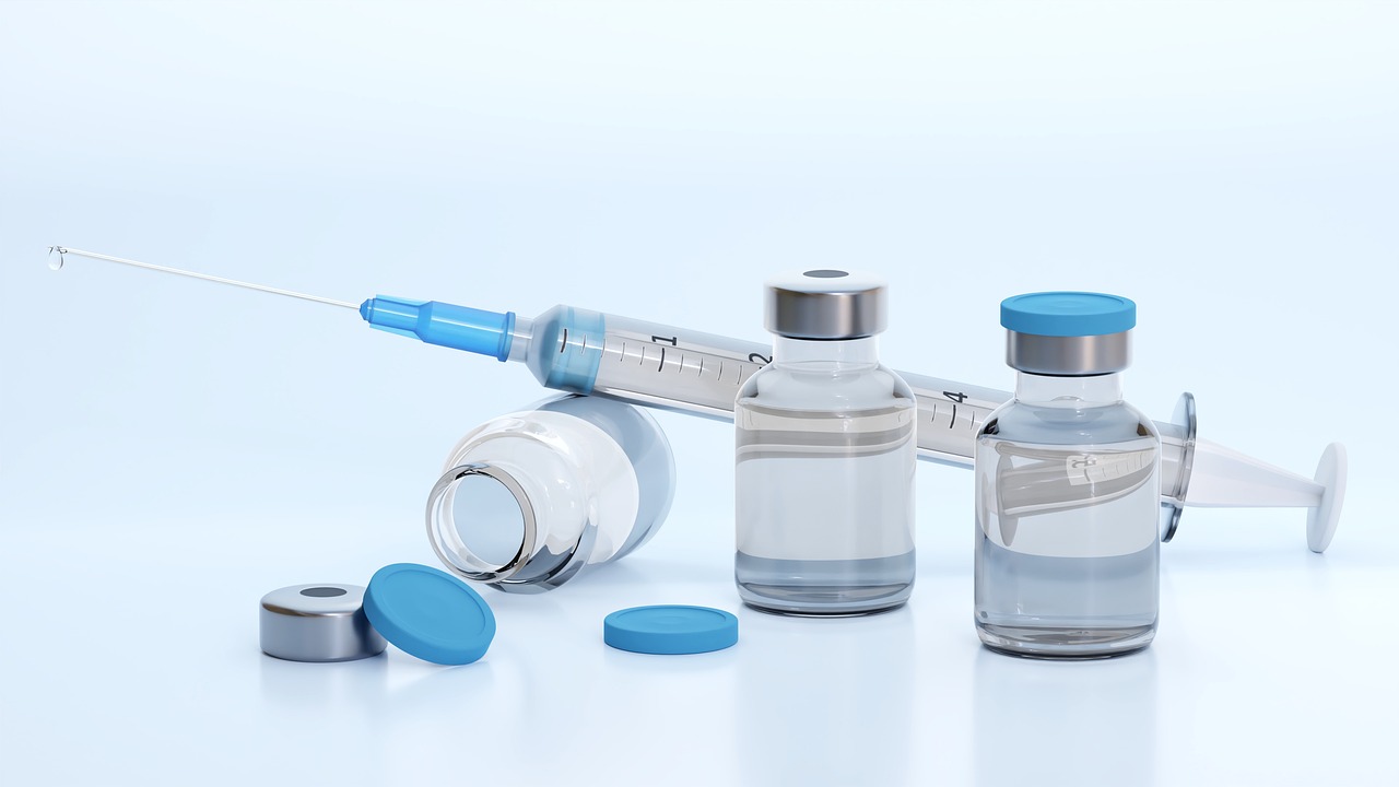 syringe and vaccine,